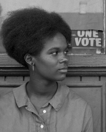 Local Freedom School activist, Gracie Hawthorne, in front of SNCC's "One Man, One Vote" at COFO headquarters., © Herbert Randall, 1964. In 1964, Kamoinge Workshop founding member, Herbert Randall, documented the Freedom School in Hattiesburg, MS. In 2001, a collection of those photographs were published in the book Faces of Freedom Summer, by University of Alabama Press. Herb studied with Harold in 1957 leaving a memorable impression on both of them. 