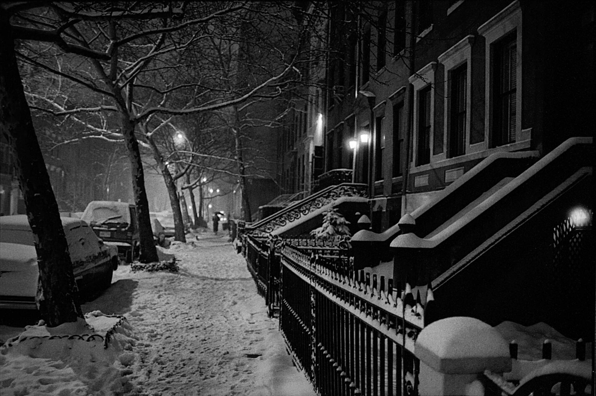 Quiet scene of fresh snow at night on W. !1th Street in New York City, 1991.